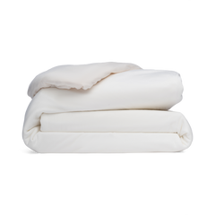 Stack of white blankets on a white background