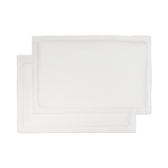 A set of flat lay white jersey knit sham pillowcases.